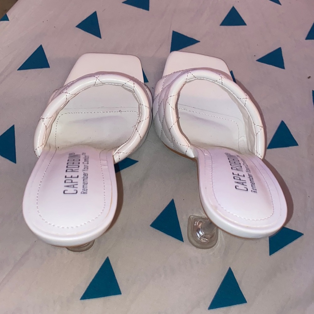 White size 7 heels . Never worn